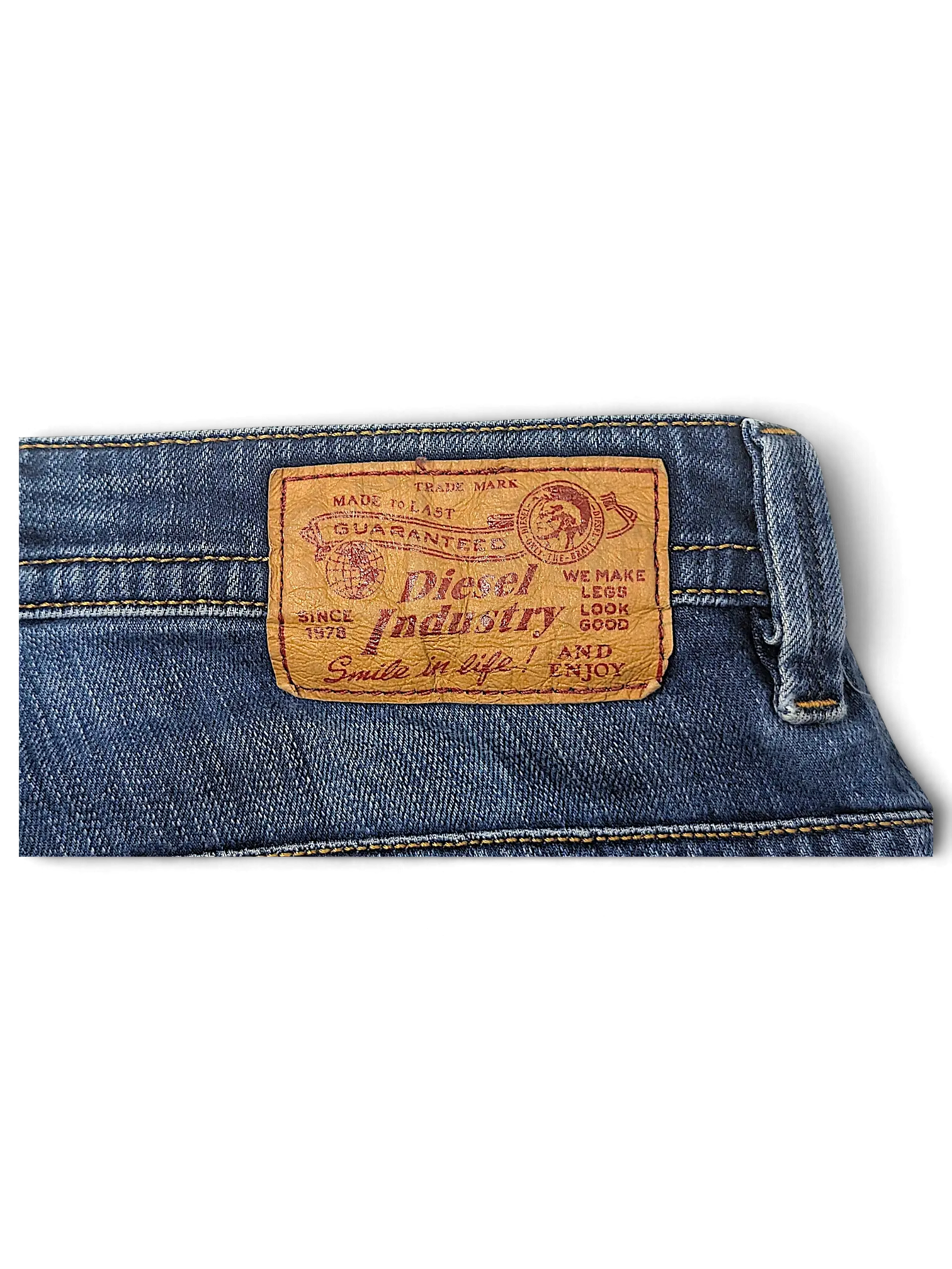 JAKE & IPI Diesel Thavar denim jeans featuring a brown leather brand patch on the back waistband