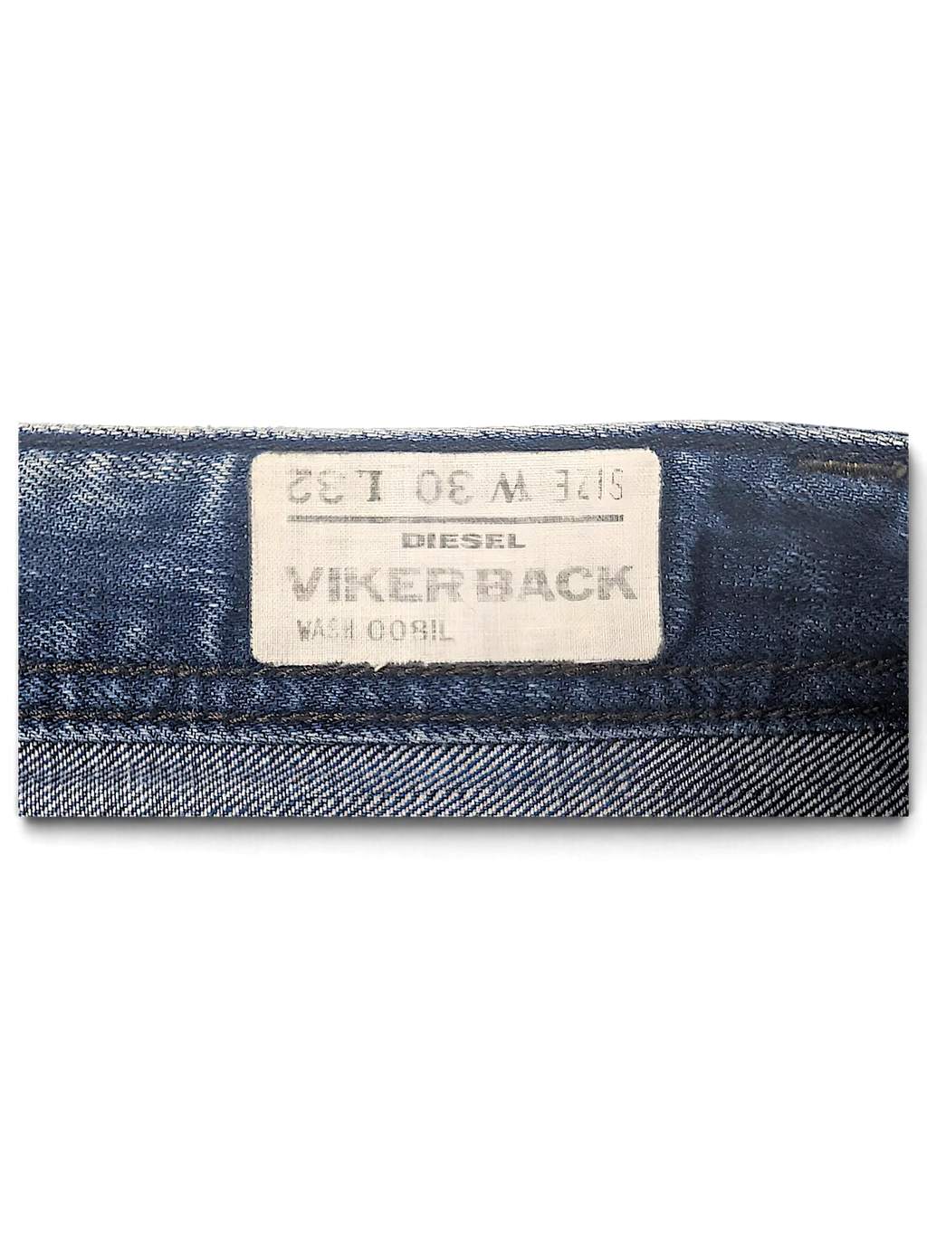 JAKE & IPI Diesel Vikerback jeans interior waist label showing size W30 L32 and wash 008IL details.