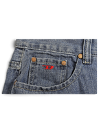 JAKE & IPI Diesel vintage blue jeans featuring a coin pocket with a red embroidered logo and copper-toned rivets.