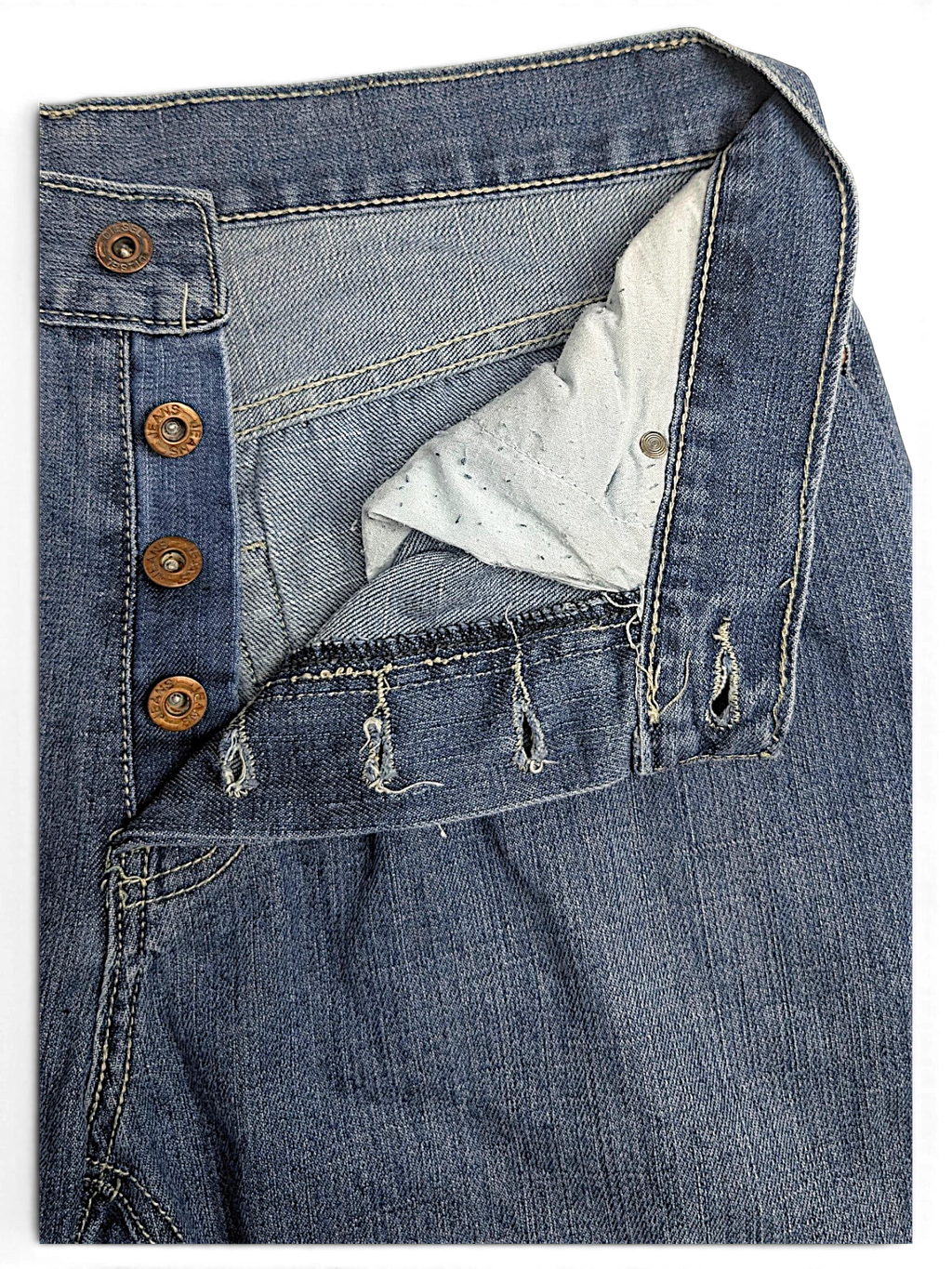 JAKE & IPI Diesel vintage blue denim jeans featuring a classic button-fly closure and five-pocket construction.