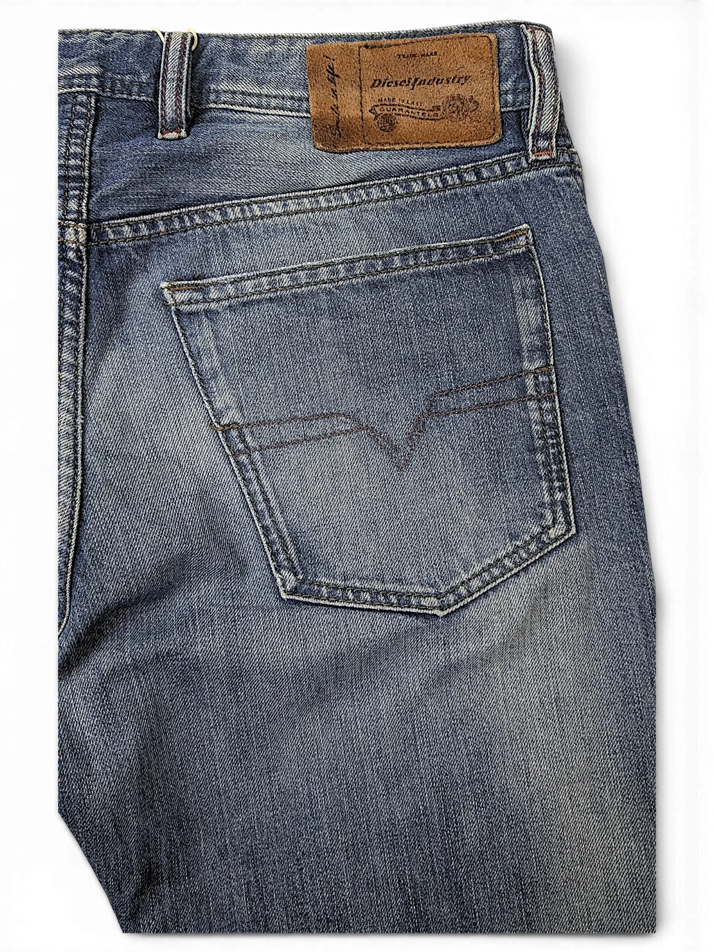JAKE & IPI Diesel Waykee blue denim jeans featuring a classic five-pocket design and a brown leather back waist patch.