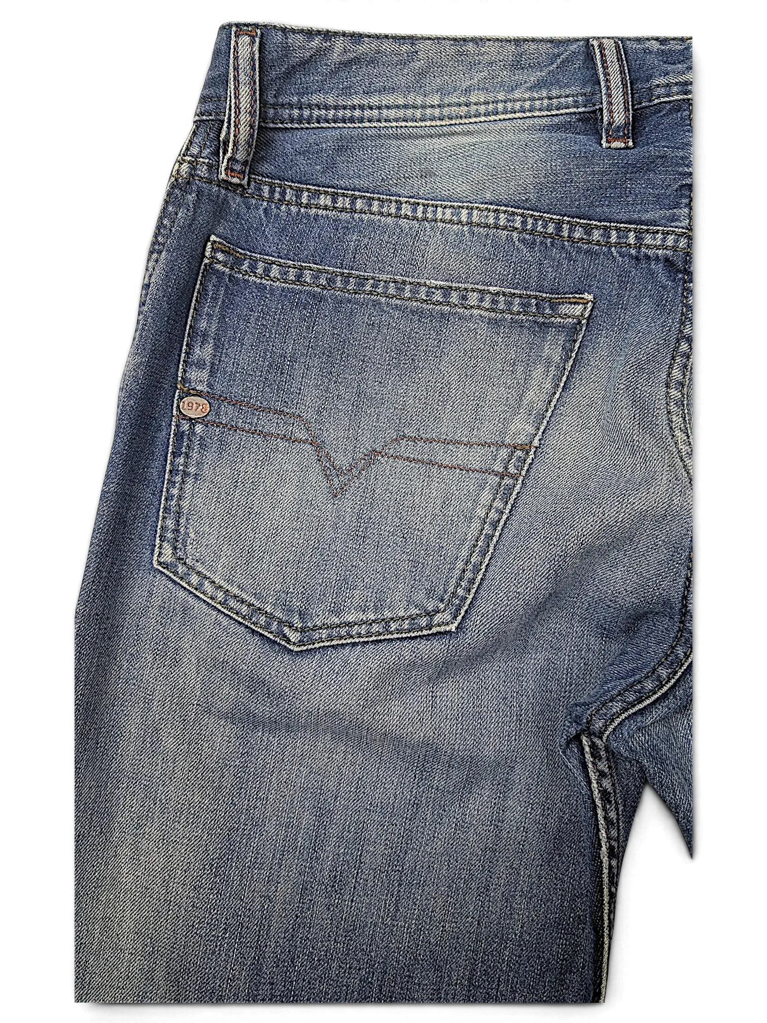 JAKE & IPI Diesel Waykee blue denim jeans featuring a classic five-pocket design and signature back pocket stitching.