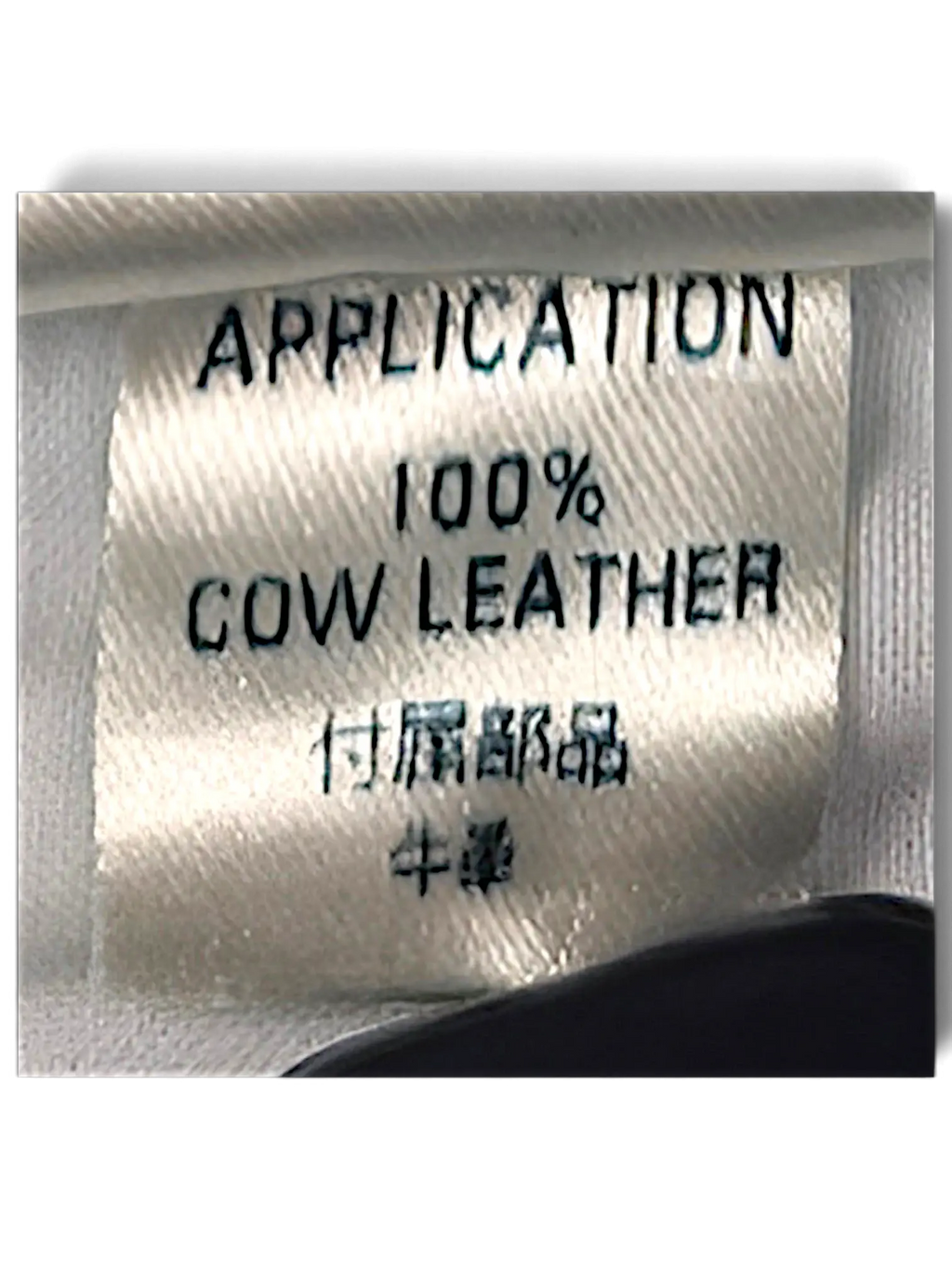 JAKE & IPI Diesel Waykee jeans care label showing 100% cow leather application detail