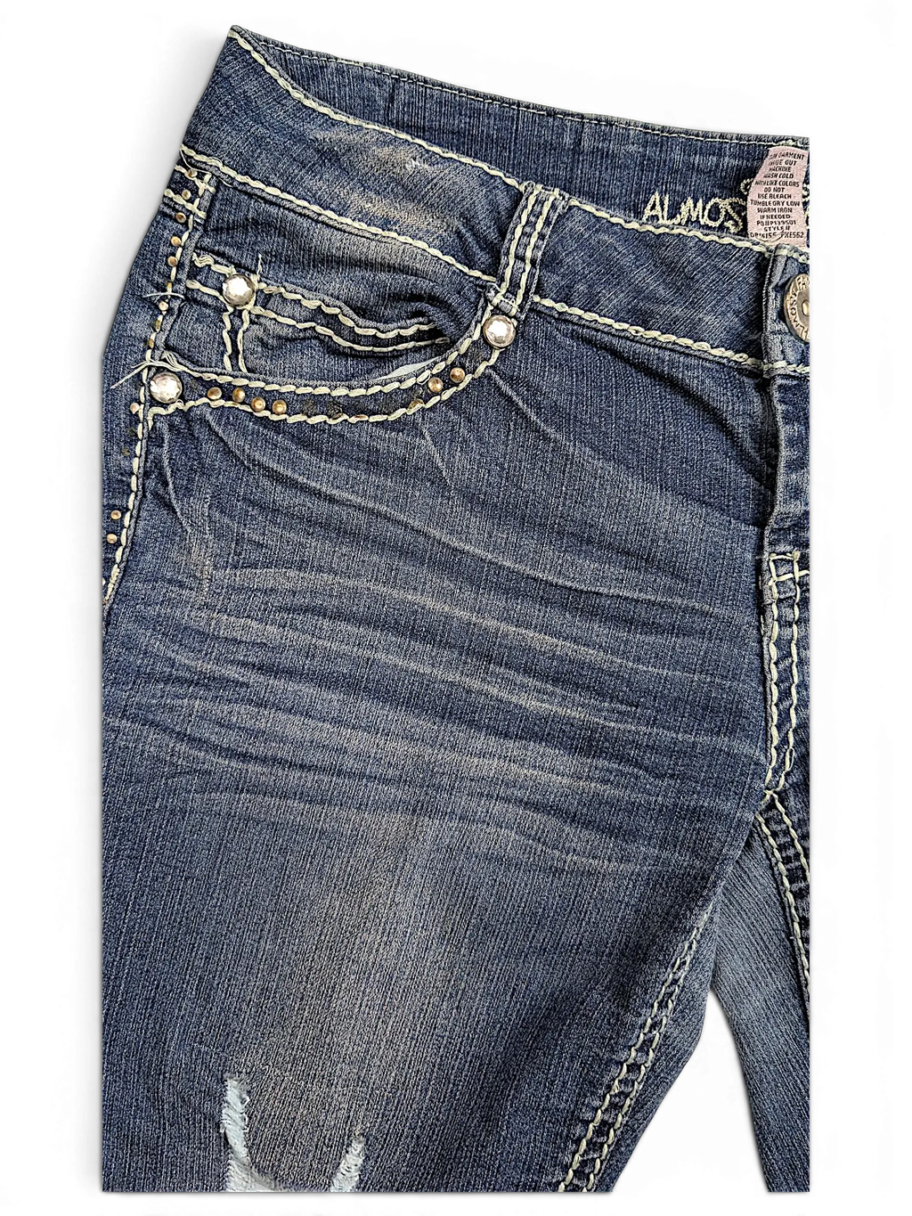 JAKE & IPI Almost Famous distressed blue denim jeans with white contrast stitching and decorative silver studs