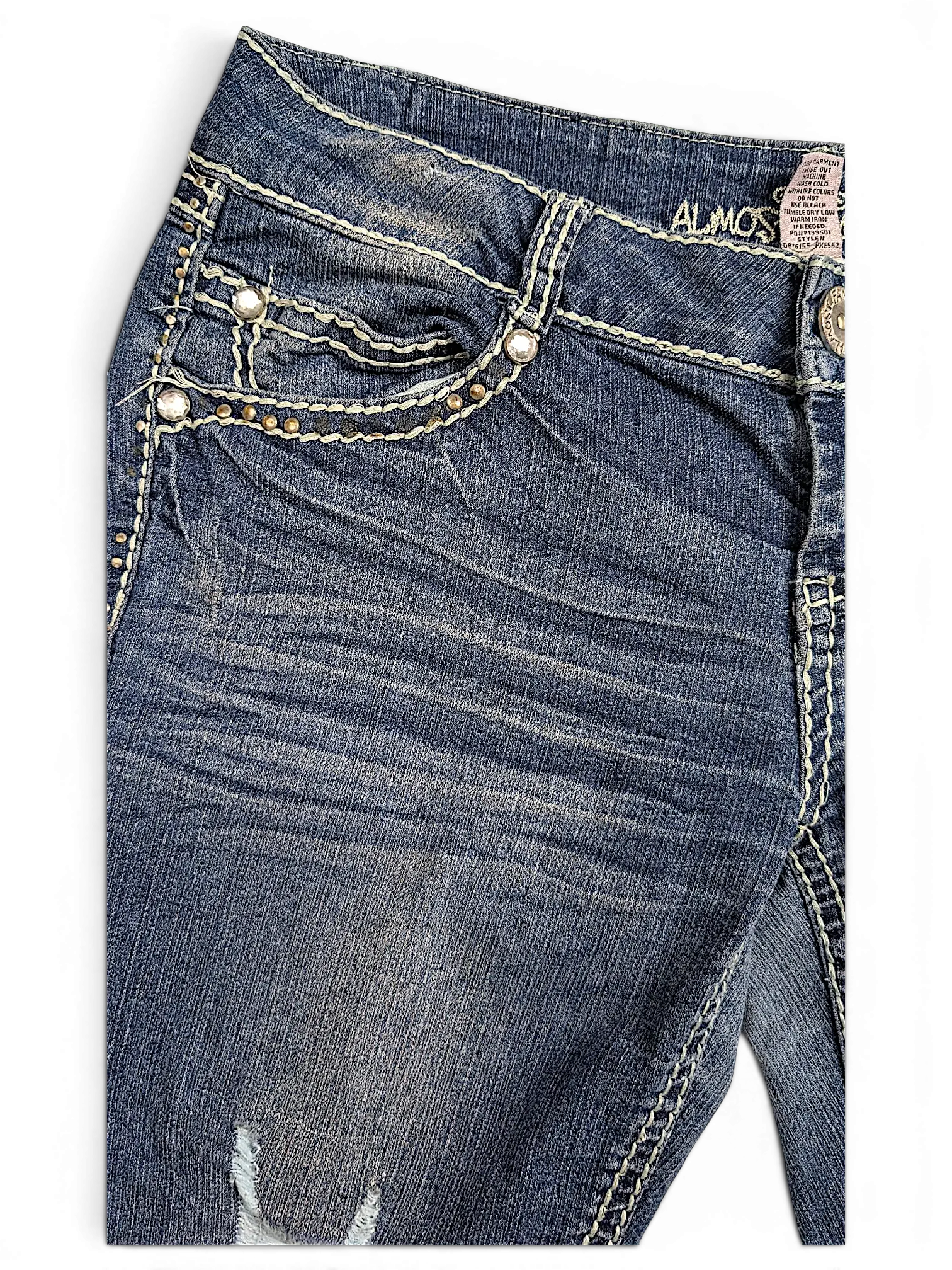 JAKE & IPI Almost Famous distressed blue denim jeans with white contrast stitching and decorative silver studs