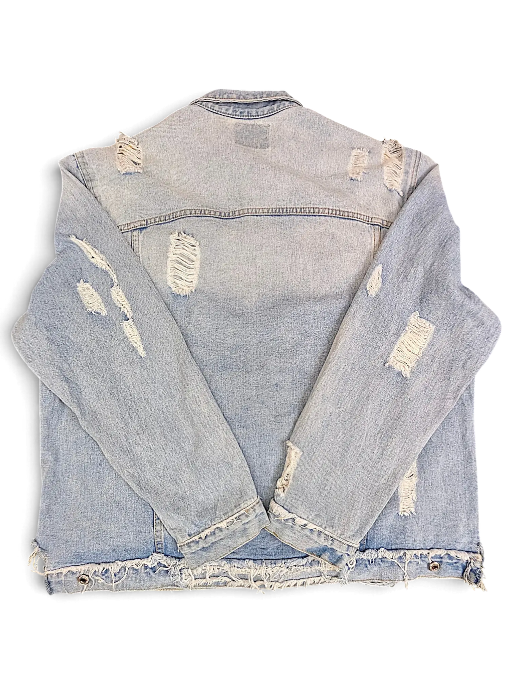 JAKE & IPI light wash denim jacket with distressed rips and a frayed raw hem, shown from the back.