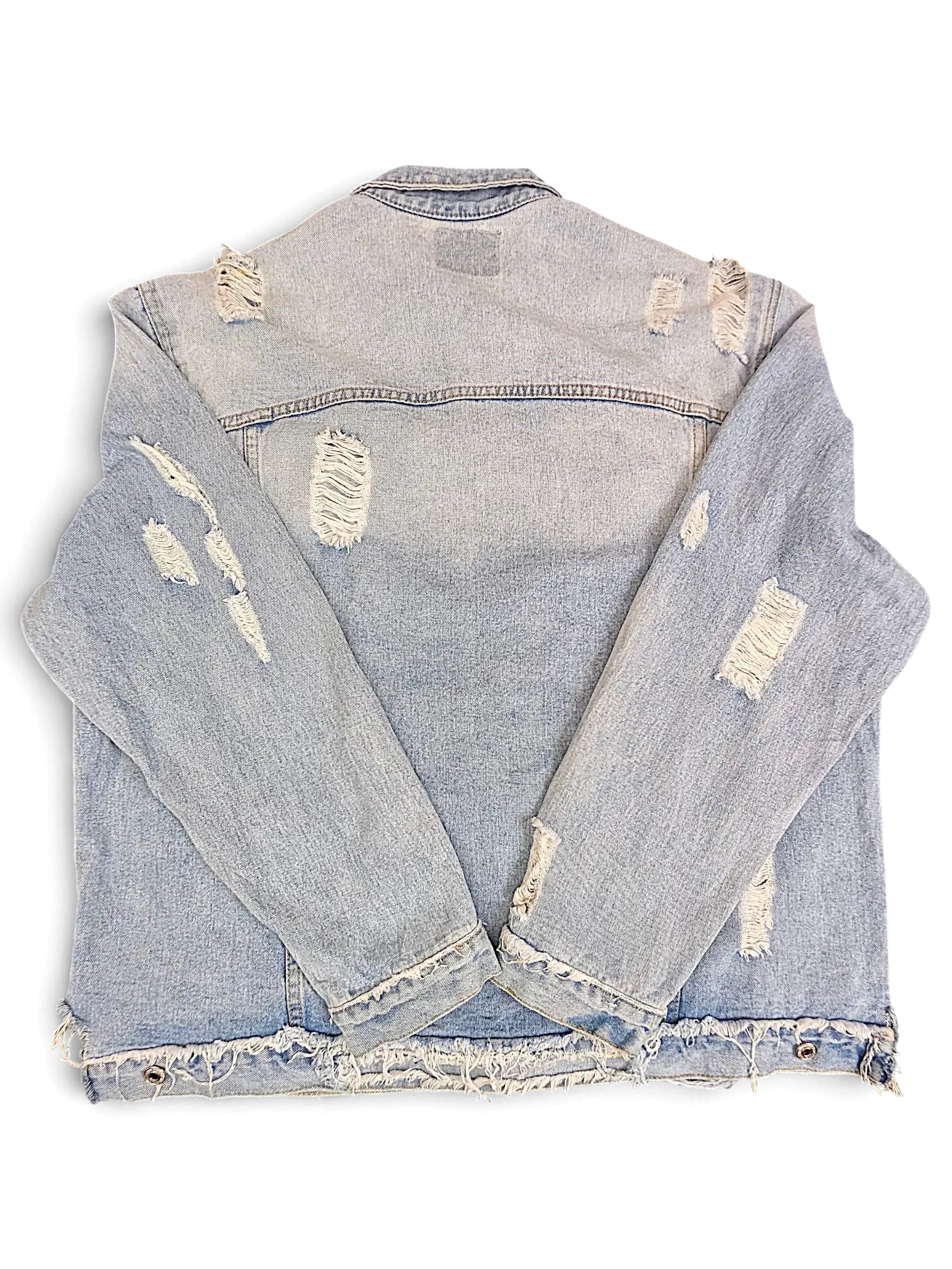 JAKE & IPI light wash denim jacket with distressed rips and a frayed raw hem, shown from the back.