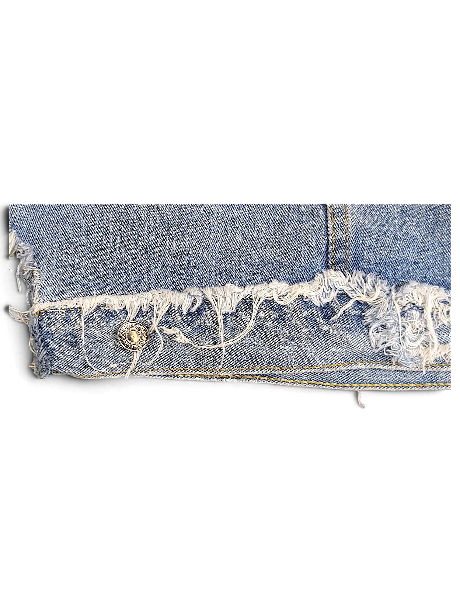 JAKE & IPI light blue denim jacket featuring a distressed frayed hem and metallic button detail