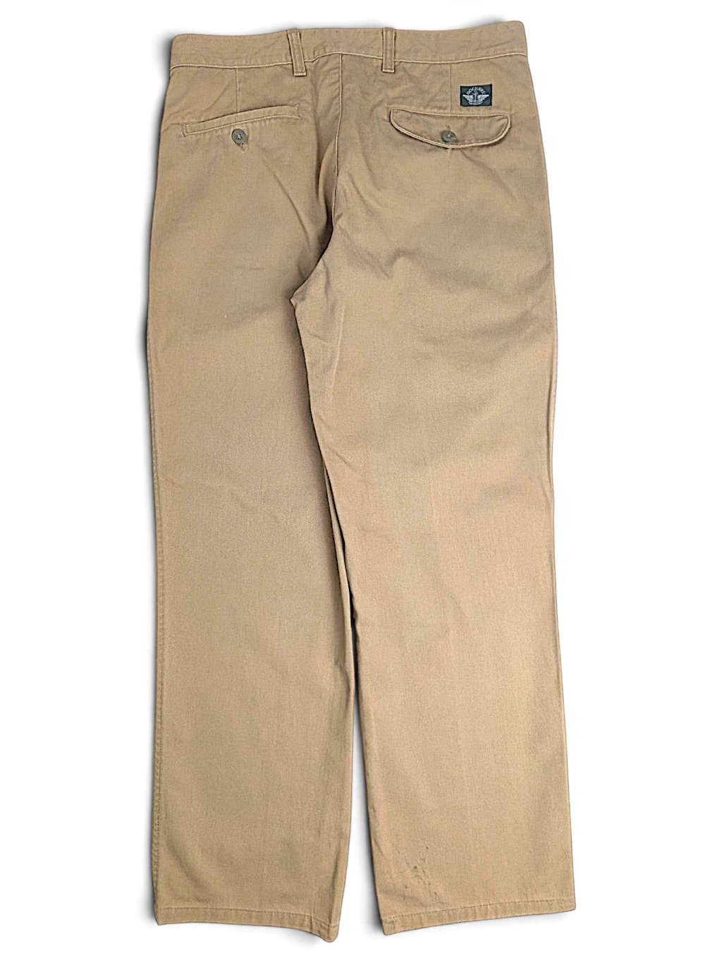 JAKE & IPI pre-owned Dockers beige cotton pleated chinos, back view showing pockets and straight leg fit.