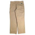 JAKE & IPI pre-owned Dockers beige cotton pleated chinos, back view showing pockets and straight leg fit.