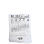 JAKE & IPI Dockers beige pleated chinos 100% cotton care label with washing instructions and Levi Strauss branding