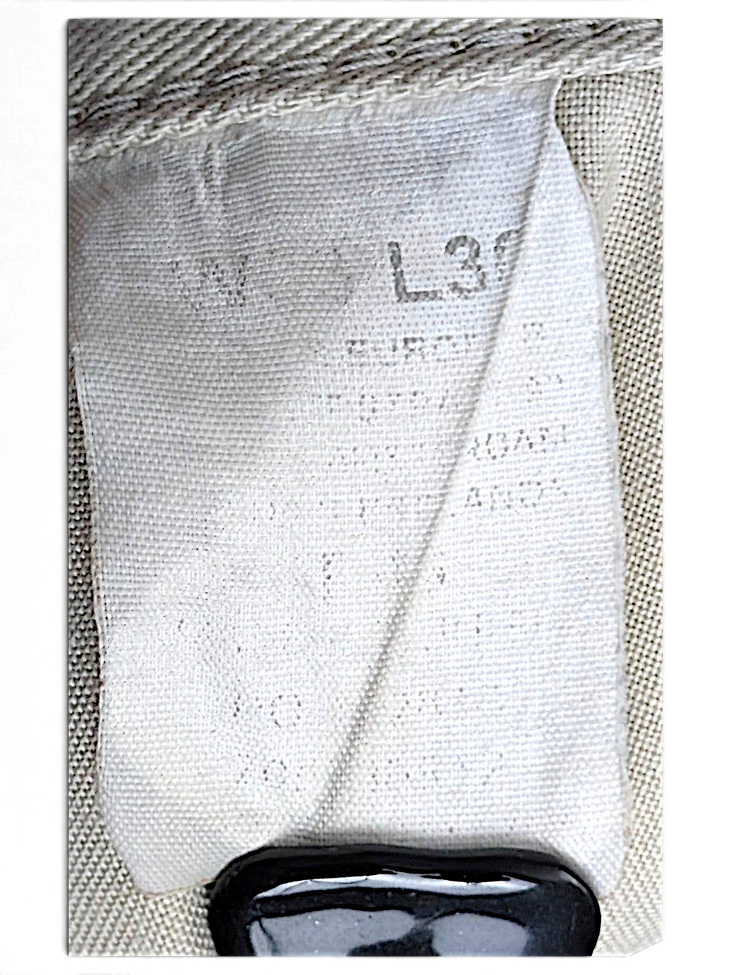 JAKE & IPI Dockers beige pleated chinos size label showing W33 L30 on cotton fabric