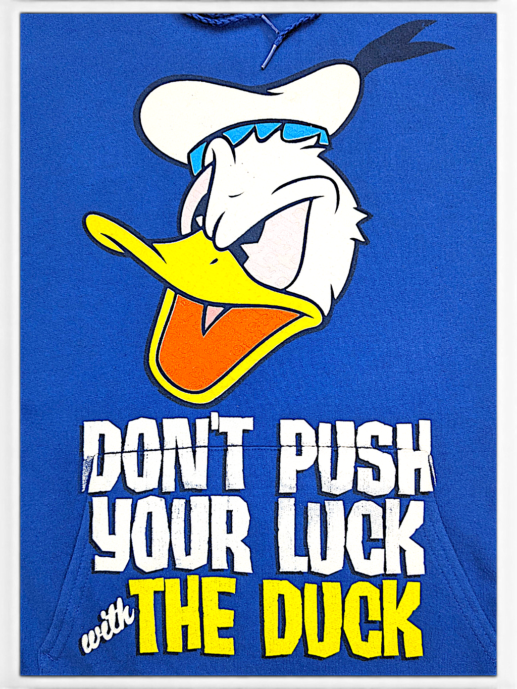 JAKE & IPI blue hoodie featuring a Donald Duck graphic and the text Don't Push Your Luck With The Duck