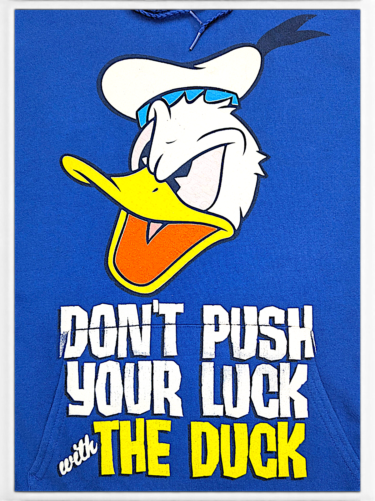 JAKE & IPI blue hoodie featuring a Donald Duck graphic and the text Don't Push Your Luck With The Duck