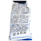 JAKE & IPI Donald Duck hoodie care label with washing instructions in English, French, and Spanish