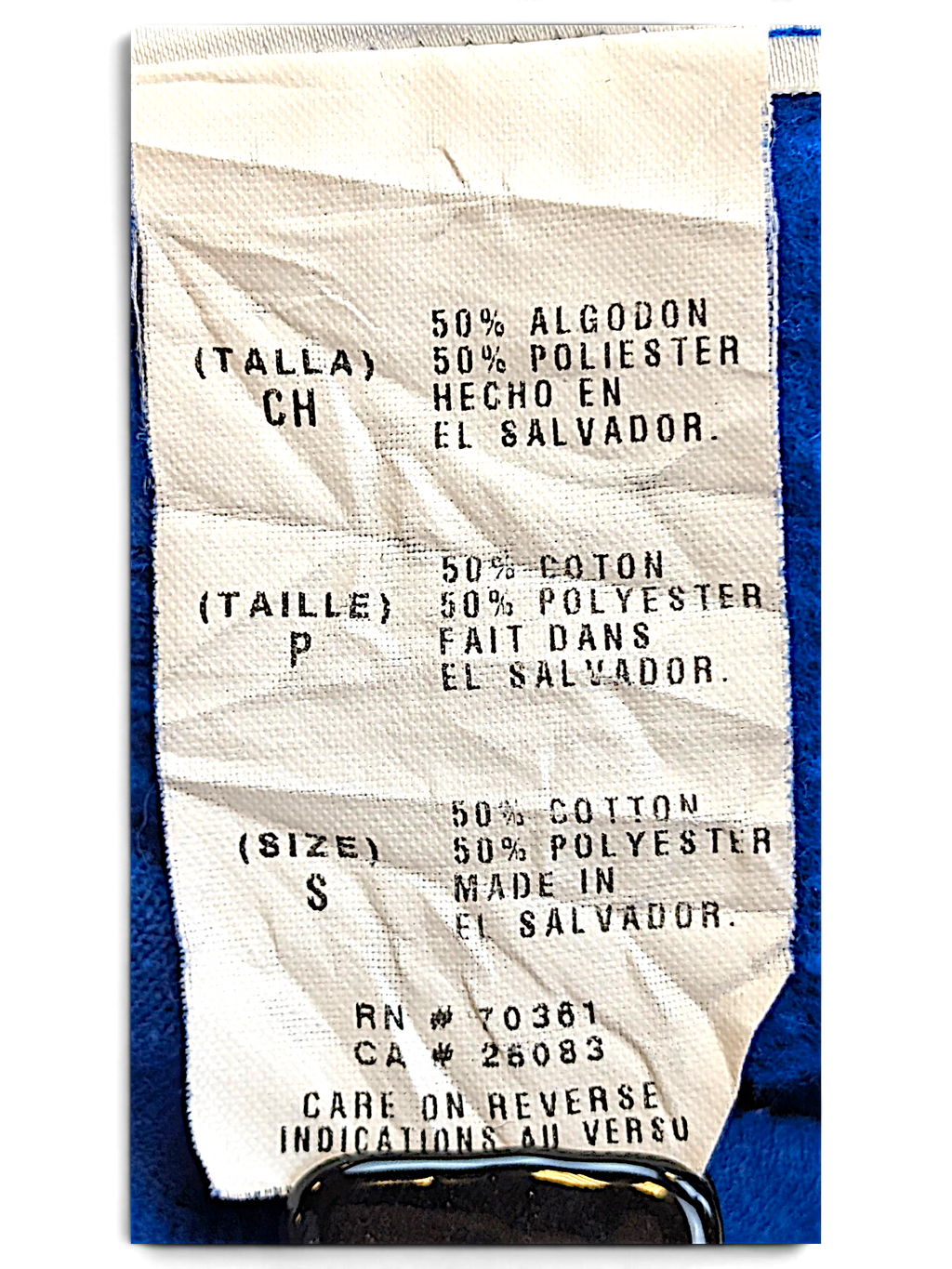 JAKE & IPI blue Donald Duck hoodie care label showing 50% cotton and 50% polyester fabric composition