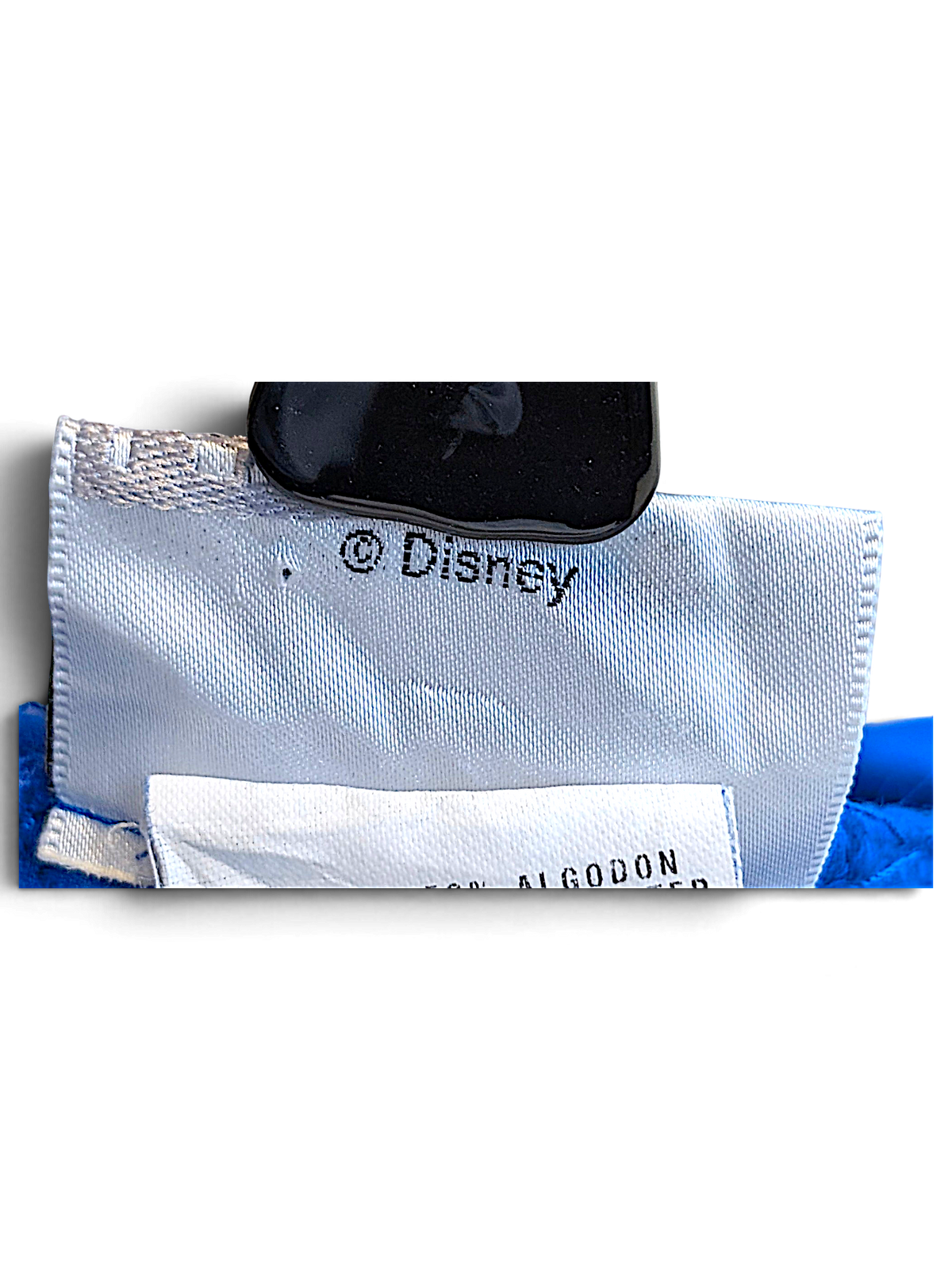 JAKE & IPI Donald Duck hoodie interior label showing Disney branding and 50 percent cotton 50 percent polyester blend