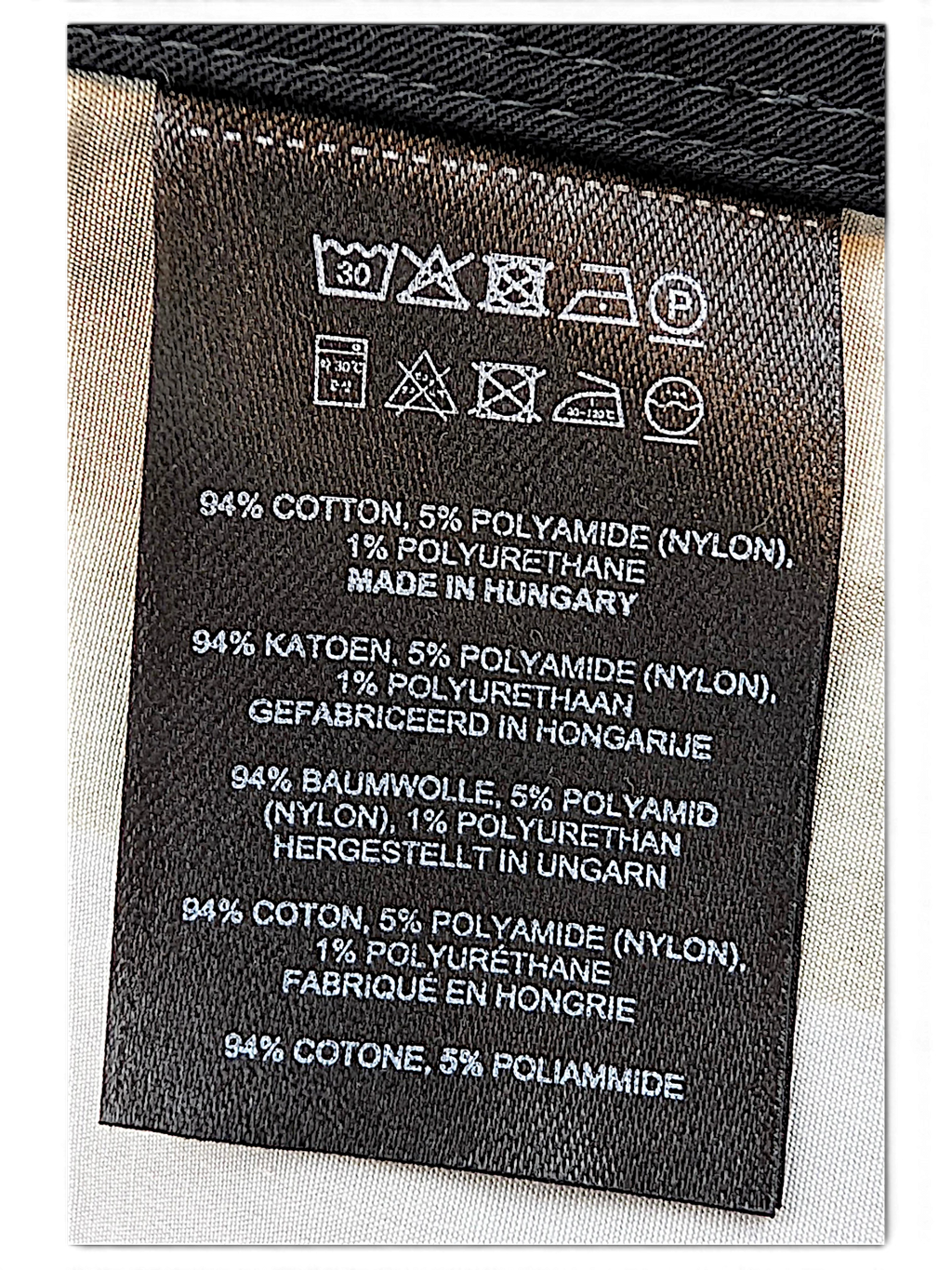 Dries Van Noten parka care label showing cotton blend and made in Hungary