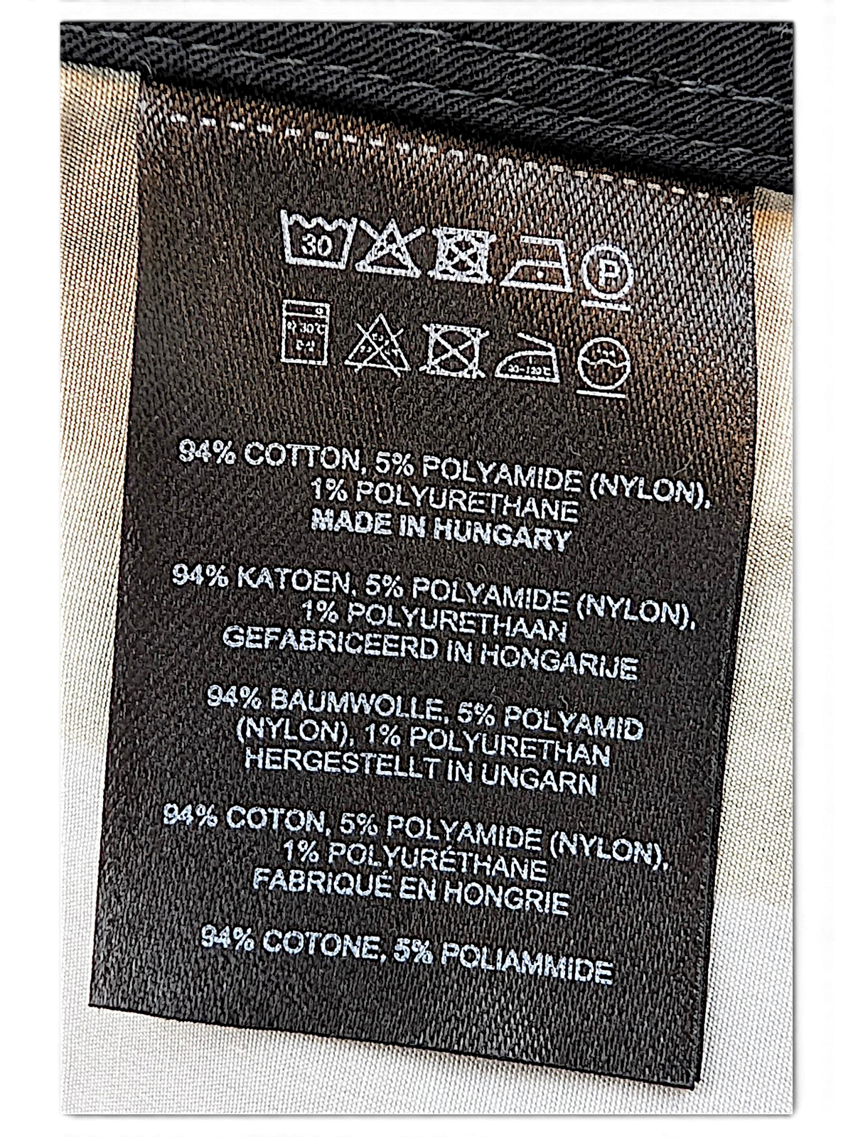Dries Van Noten parka care label showing cotton blend and made in Hungary