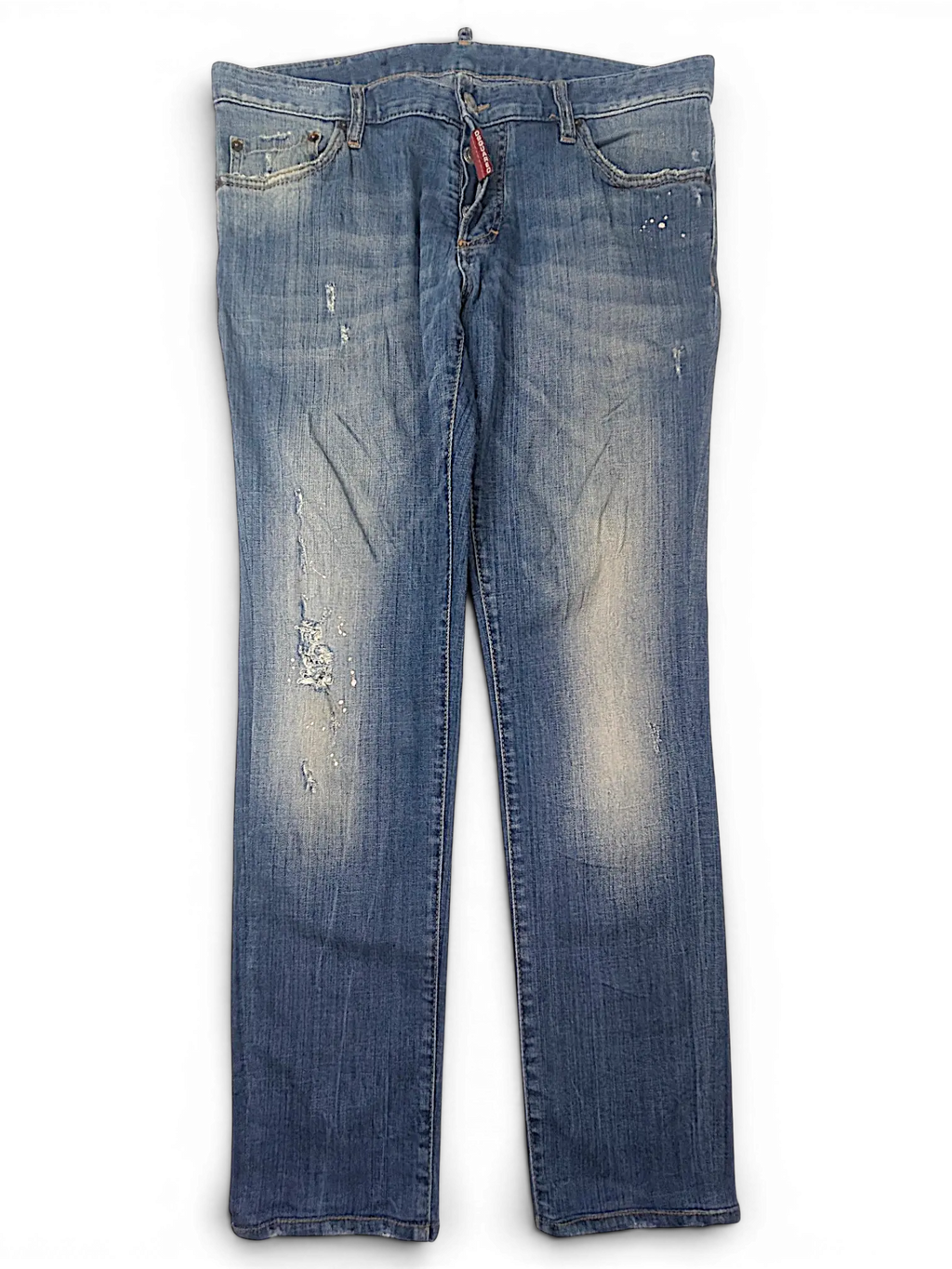 JAKE & IPI Dsquared2 blue denim jeans with distressed details, paint splatters, and a classic five-pocket design.