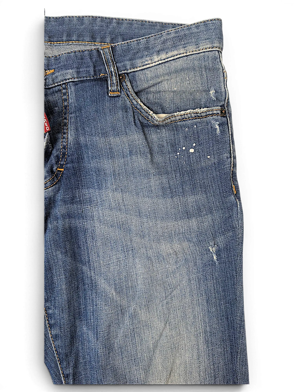 JAKE & IPI Dsquared2 blue denim jeans with distressed details, paint splatters, and classic five-pocket construction.