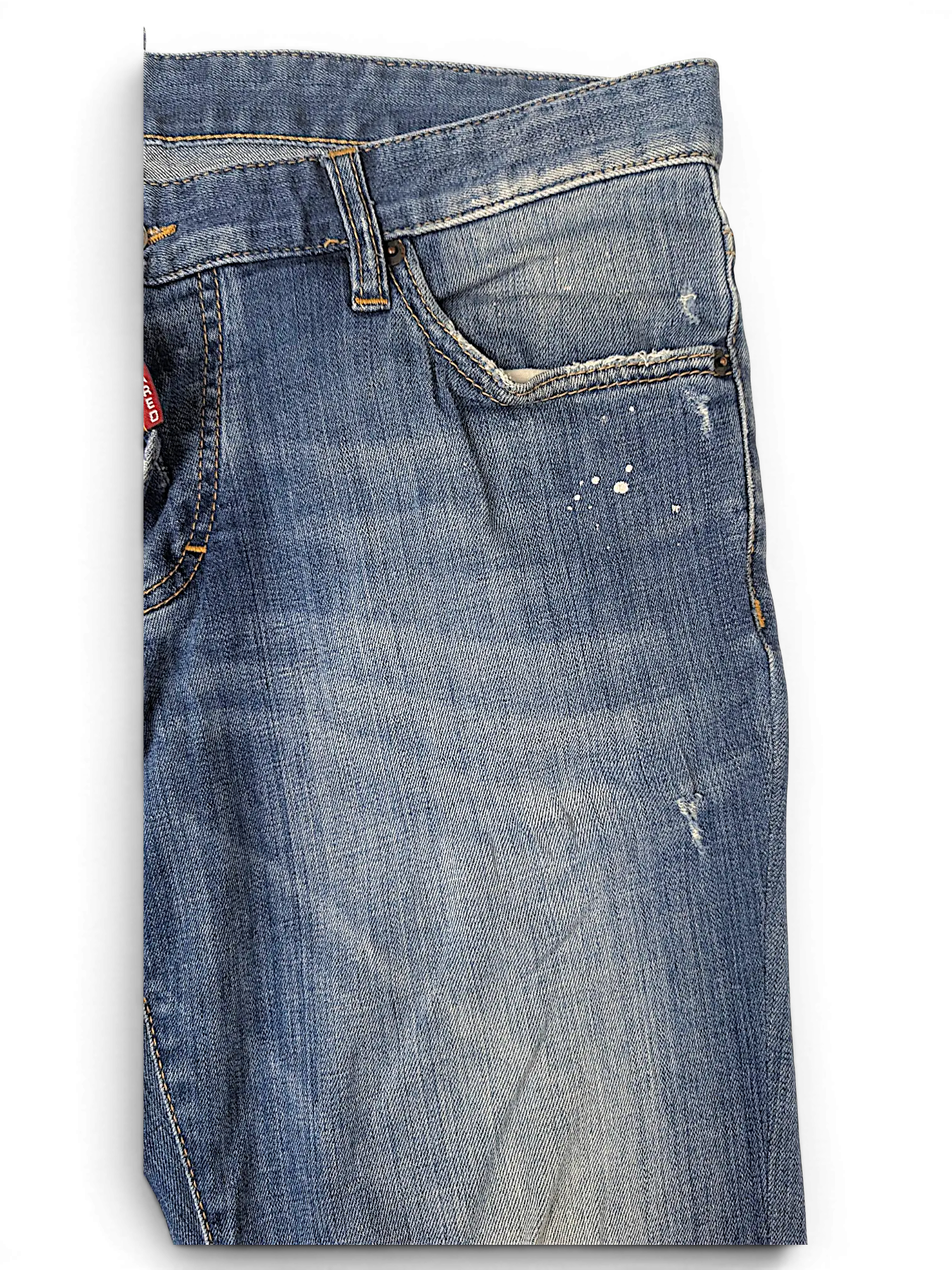 JAKE & IPI Dsquared2 blue denim jeans with distressed details, paint splatters, and classic five-pocket construction.