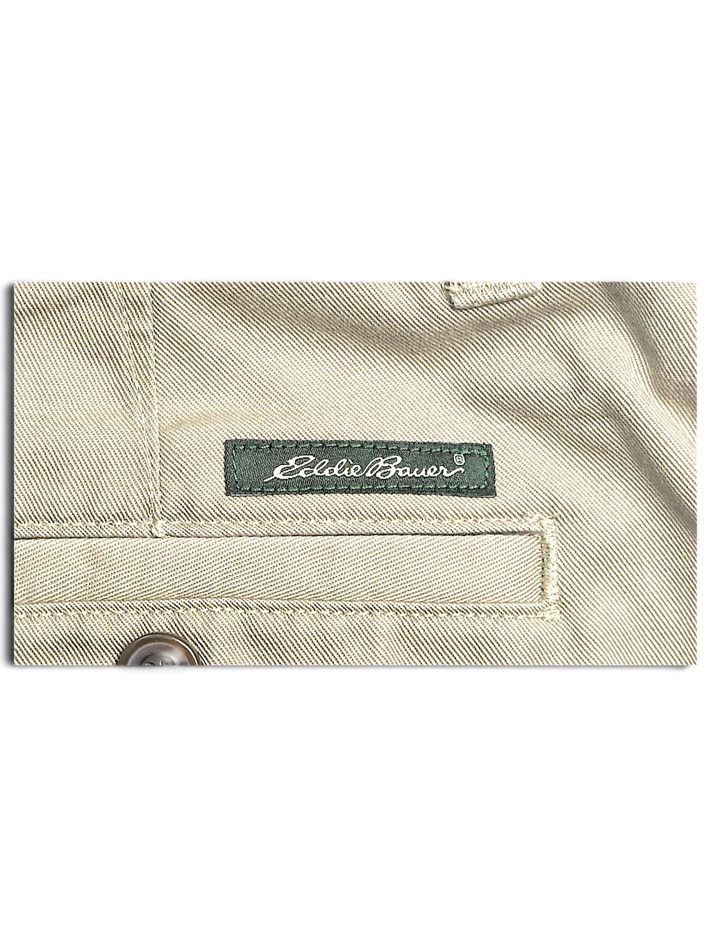 JAKE & IPI Eddie Bauer beige cotton chino pants featuring a branded green fabric label and stitched pocket detail