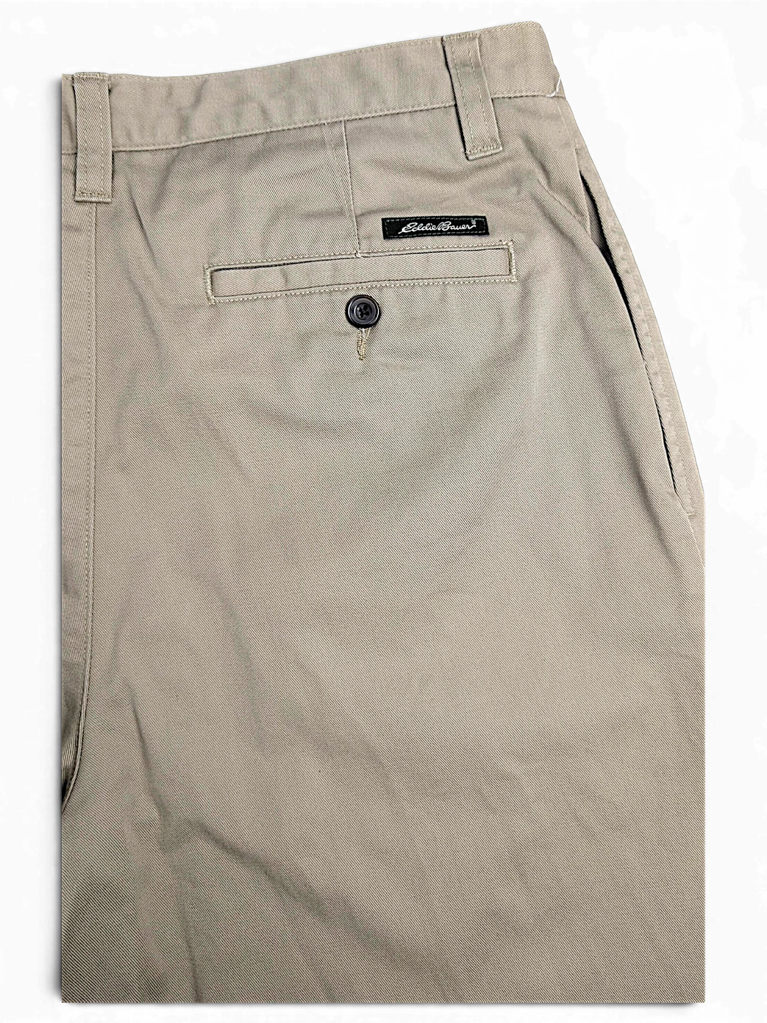 JAKE & IPI Eddie Bauer beige cotton pleated chinos with a buttoned back pocket detail.