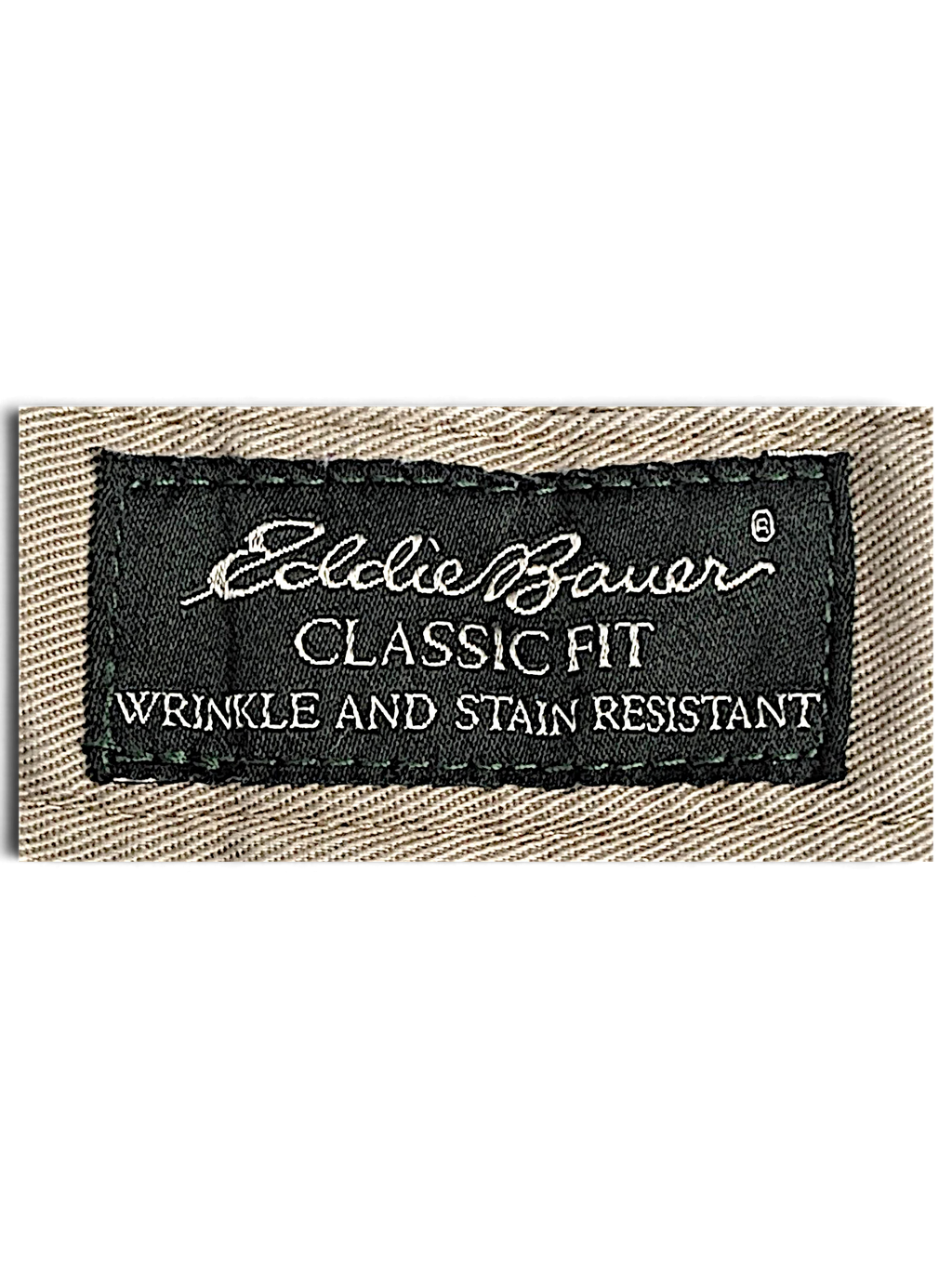 JAKE & IPI Eddie Bauer Classic Fit wrinkle and stain resistant label on beige cotton fabric