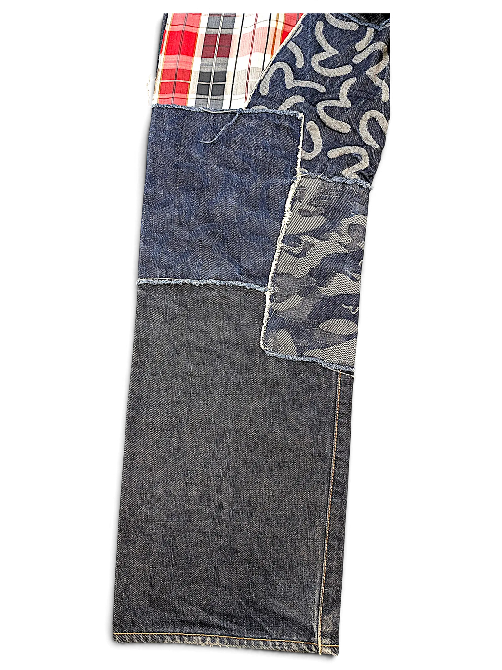 JAKE & IPI Evisu One Of One jeans featuring a patchwork design of denim, camo, and red plaid fabric panels.