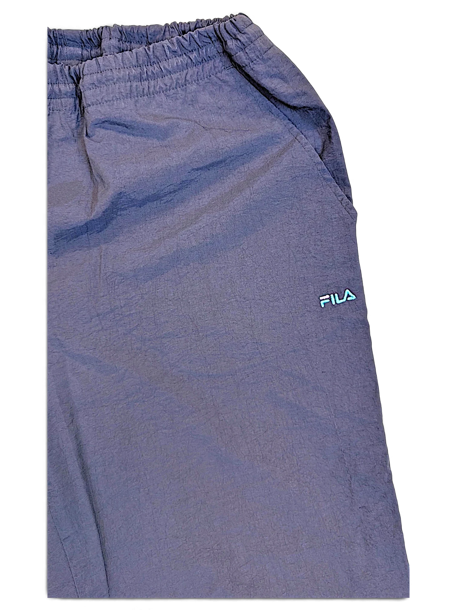 JAKE & IPI pre-owned dark navy Fila track pants with an elasticated waistband and embroidered logo detail.