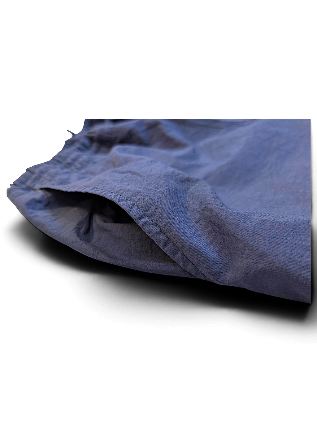 JAKE & IPI pre-owned Fila dark navy track pants featuring a close-up of the side pocket detail.