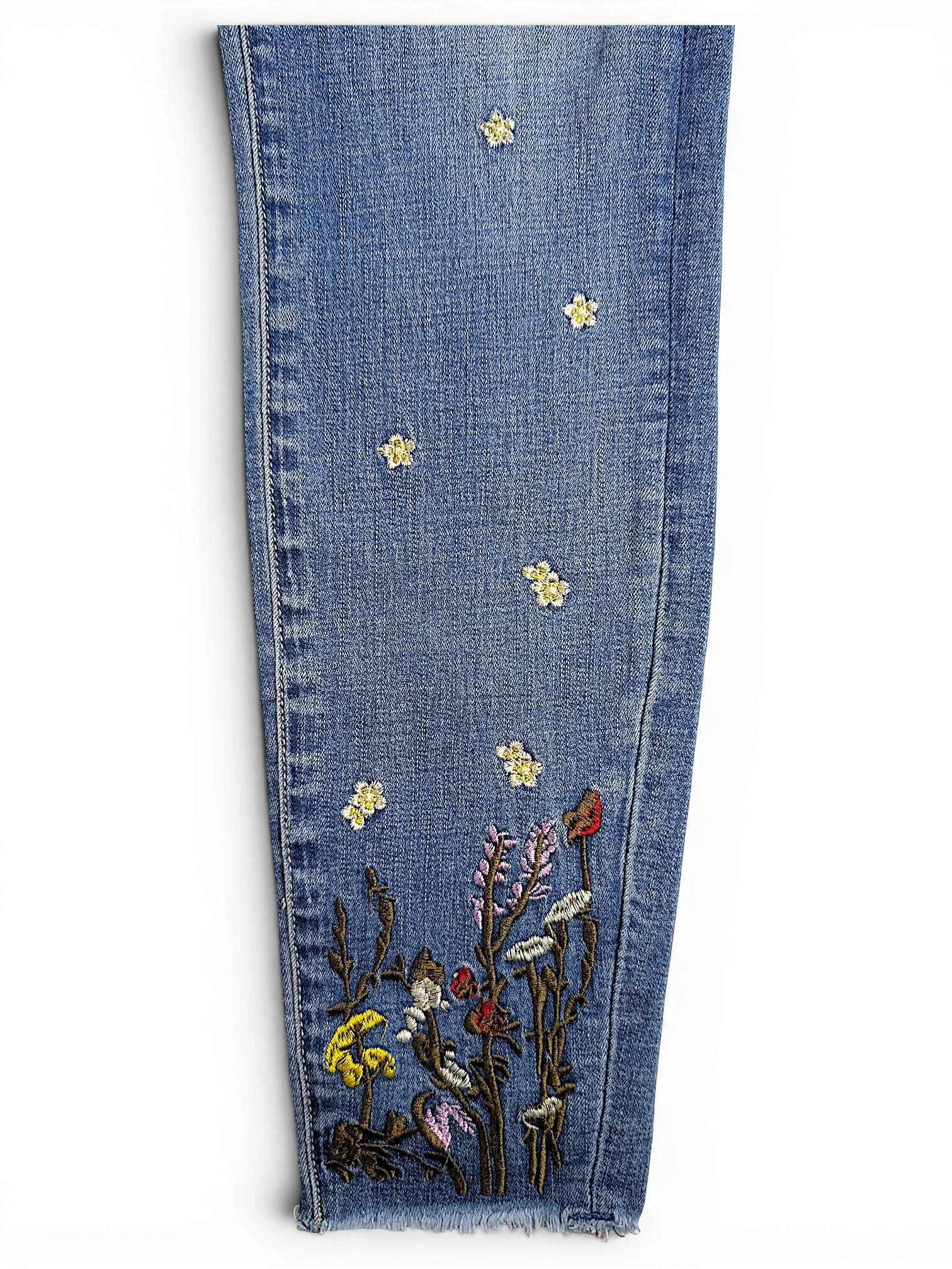 JAKE & IPI Amisu skinny jeans in light blue denim featuring delicate floral embroidery and a raw frayed hem