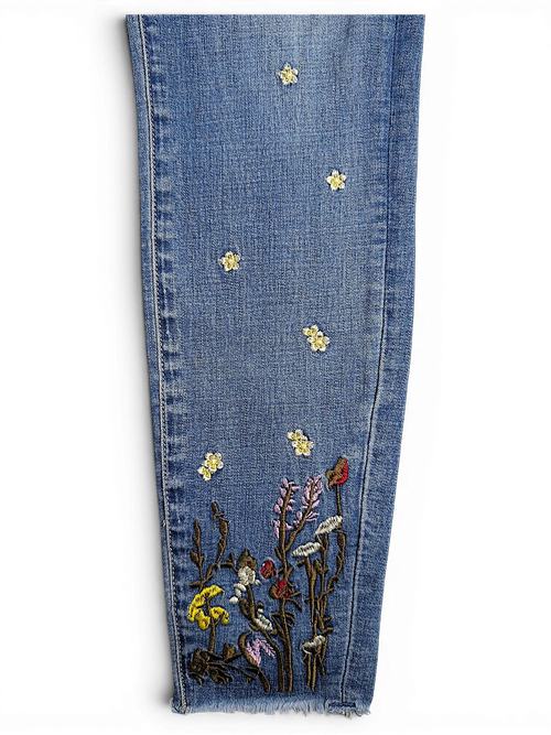 JAKE & IPI Amisu skinny jeans in light blue denim featuring delicate floral embroidery and a raw frayed hem