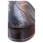 JAKE & IPI Fratelli Rossetti black leather loafer heel showing surface wear and scuffing on the leather upper
