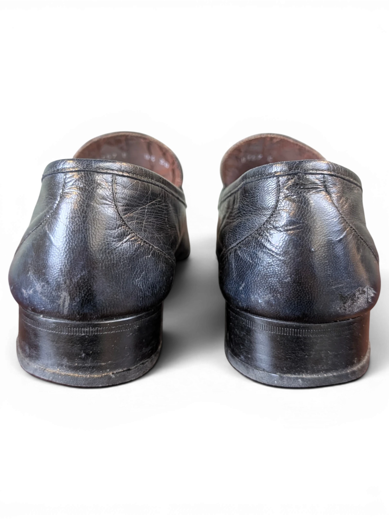 JAKE & IPI Fratelli Rossetti black leather loafers shown from the back heel view.