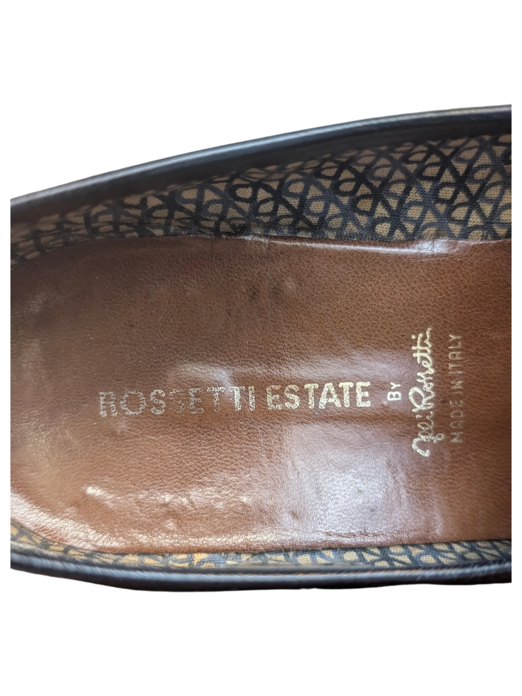 Interior of JAKE & IPI Fratelli Rossetti Estate black leather loafers showing branded brown leather insole