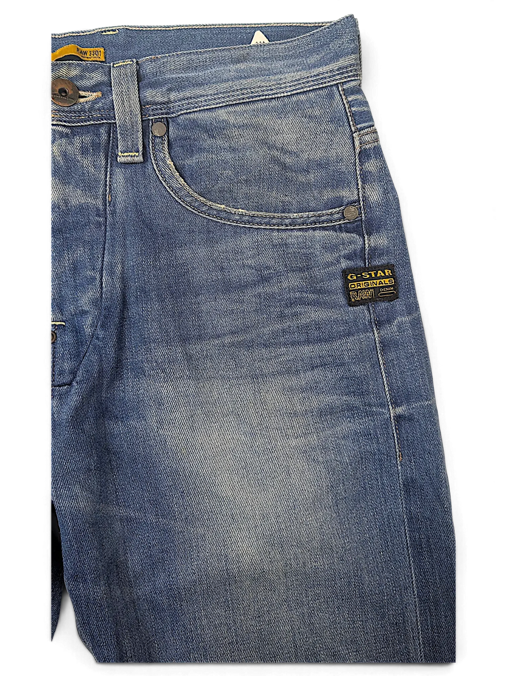 JAKE & IPI G-Star blue denim jeans featuring a classic five-pocket design and a branded patch on the front pocket.