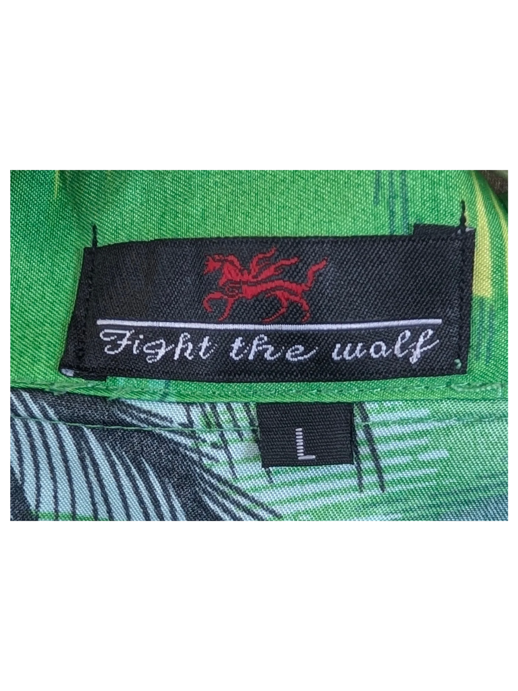 JAKE & IPI Fight The Wall Hawaiian shirt featuring a green tropical print and a size large neck label