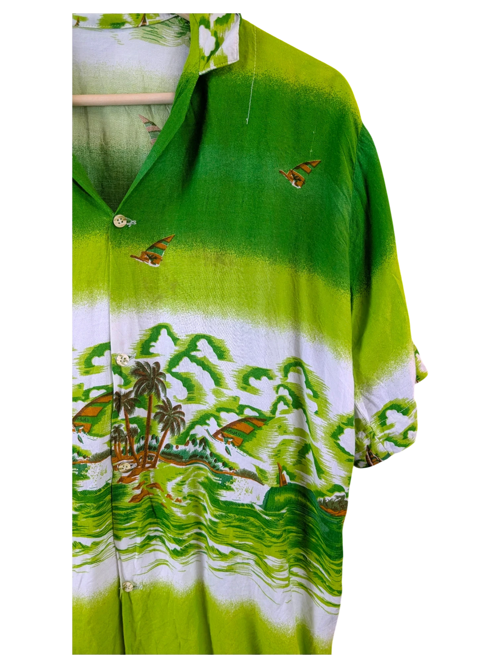 JAKE & IPI green Hawaiian shirt featuring a tropical landscape print with palm trees and sailboats