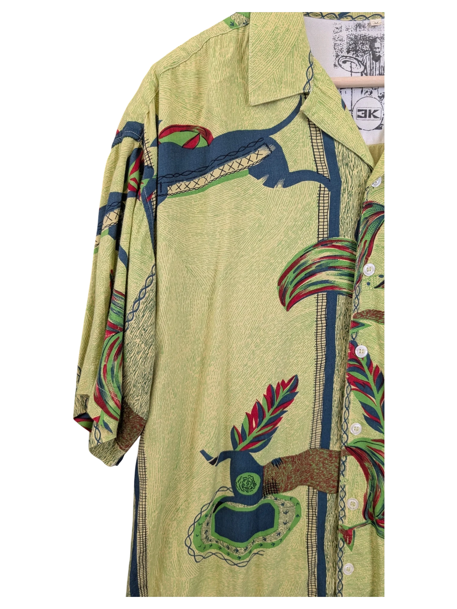 JAKE & IPI green Hawaiian shirt with a tropical abstract print, short sleeves, and a classic collar.