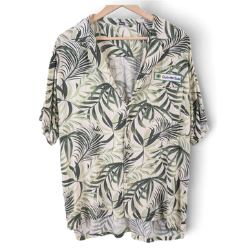 JAKE & IPI Gary's Hawaiian shirt in cream and green palm leaf print with a Club del Sole patch, missing one button.