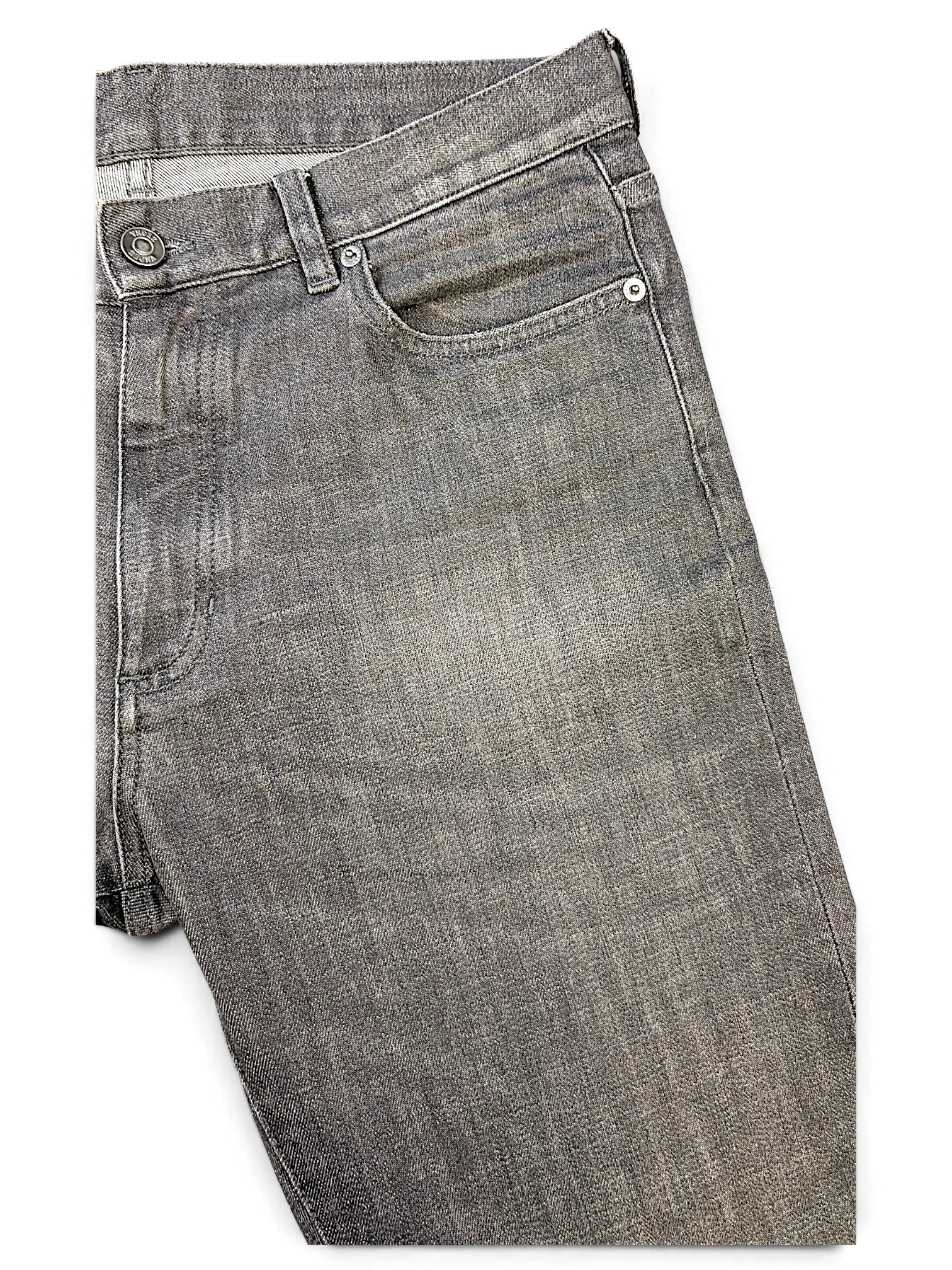 JAKE & IPI grey denim jeans featuring a classic five-pocket design with metal button and rivet detailing.