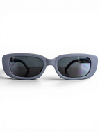 JAKE & IPI Sunkak sunglasses with a matte grey rectangular frame and dark tinted lenses on a black background.
