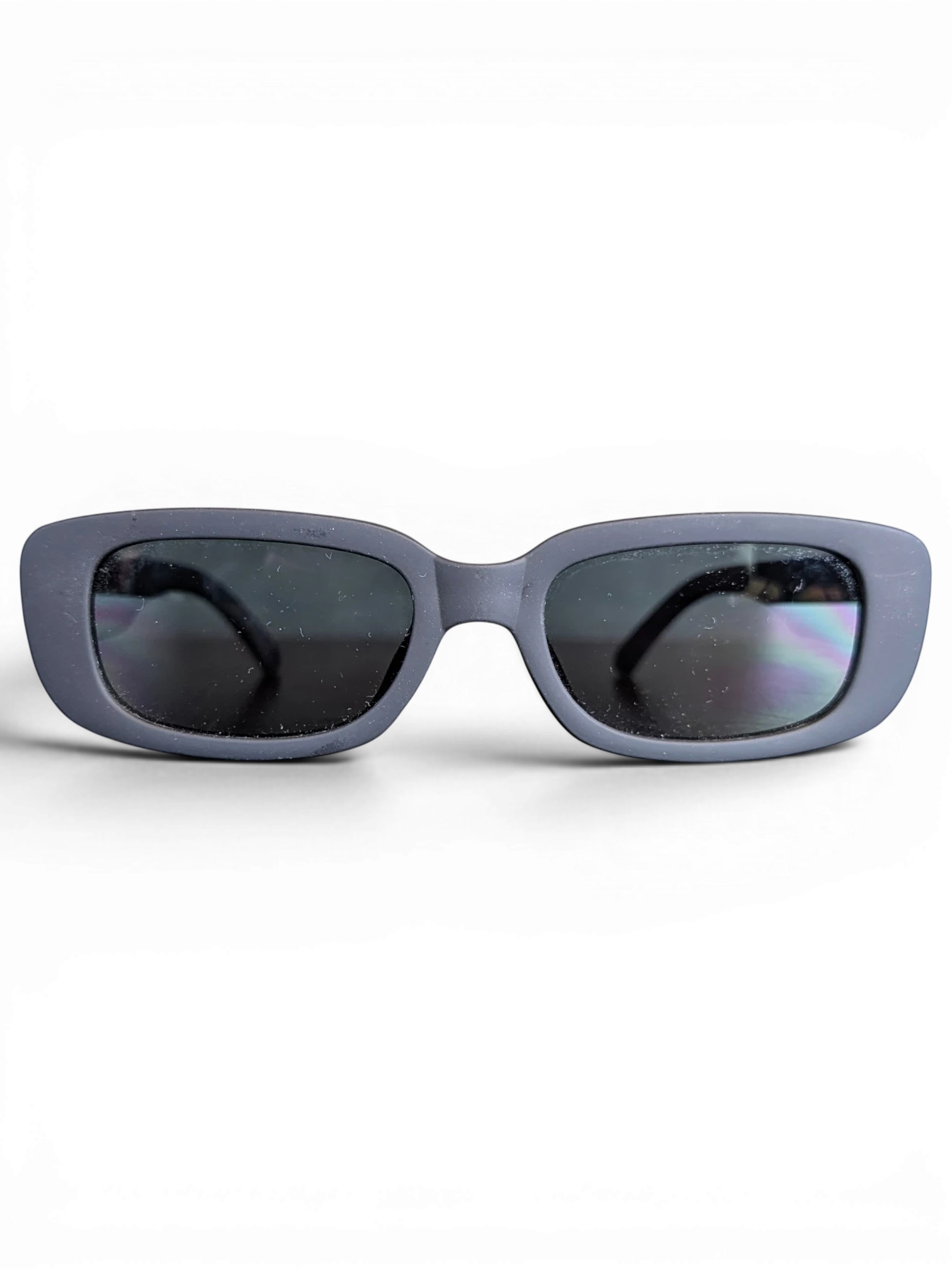JAKE & IPI Sunkak sunglasses with a matte grey rectangular frame and dark tinted lenses on a black background.