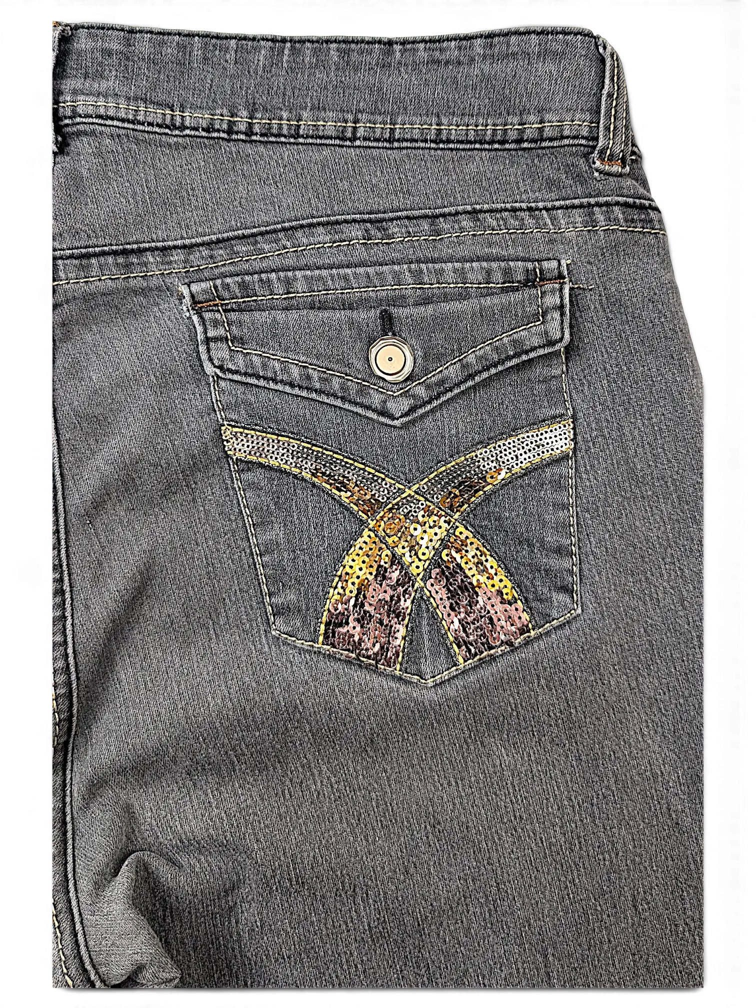 JAKE & IPI grey denim jeans featuring a back pocket with gold and pink sequin cross detailing and a button flap.