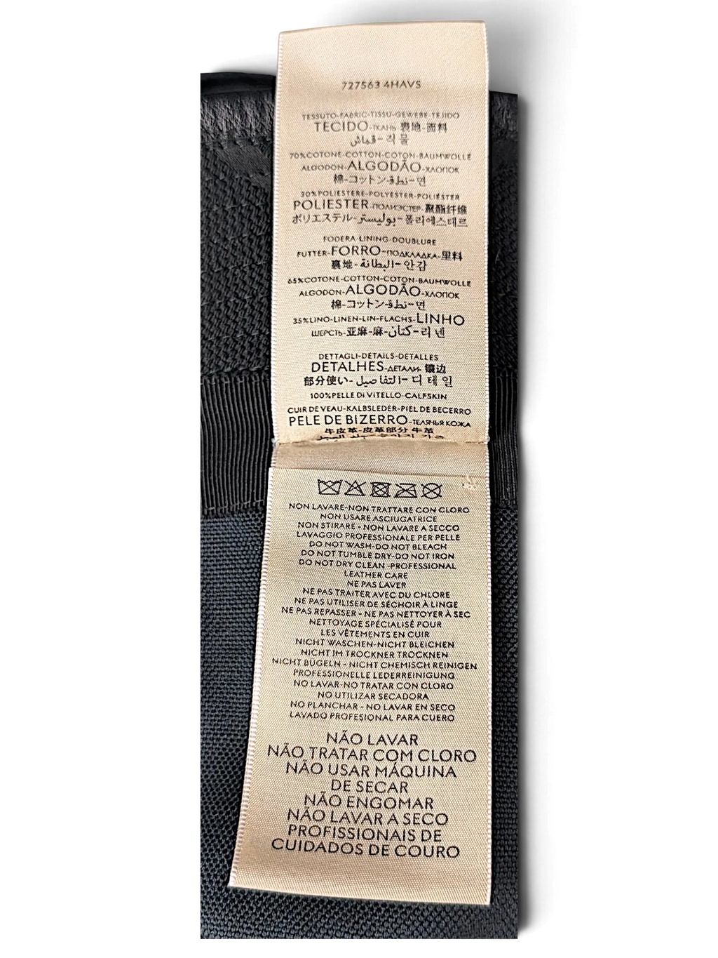 JAKE & IPI Gucci bucket hat care label showing material composition of cotton, polyester, linen, and calfskin leather