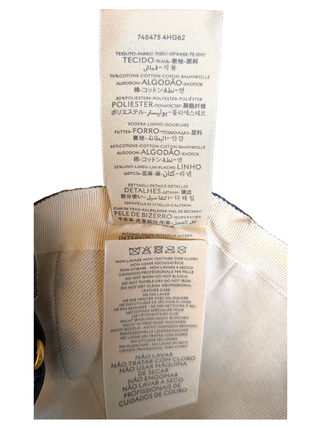 JAKE & IPI Gucci blue cap interior fabric care label with cotton and linen composition details