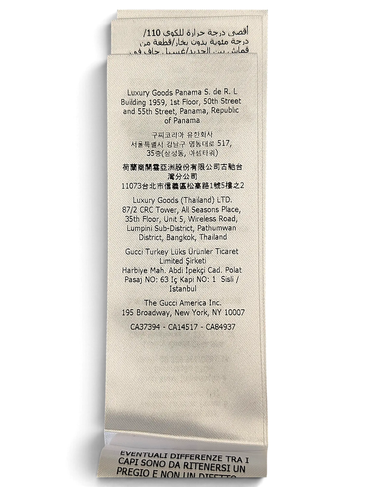 JAKE & IPI Gucci shirt white fabric care and origin label with detailed international company information