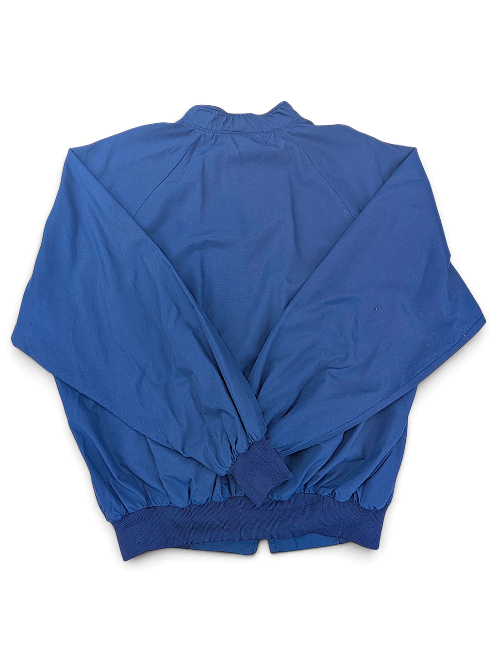 Hartwell Blue Zip Jacket; Plain blue back with ribbed hem.
